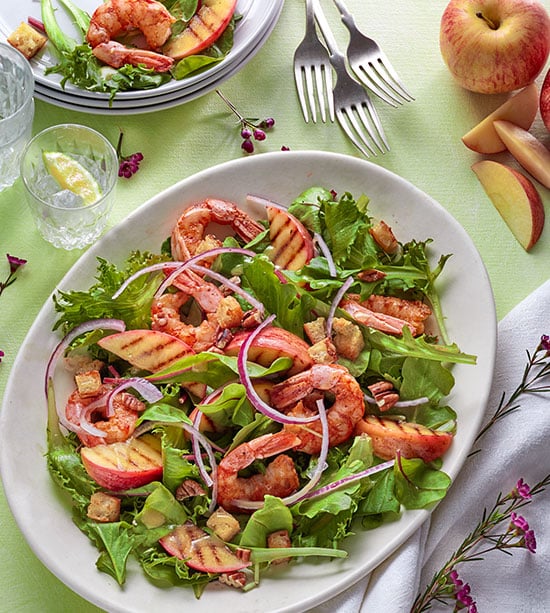 Warm grilled apple and Argentinean shrimp salad