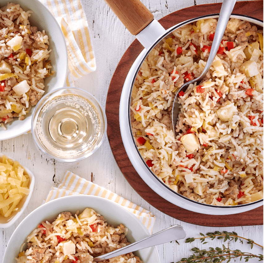 One pot of rice with pork and apples